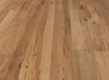 A skilled contractoood floor with a sander in