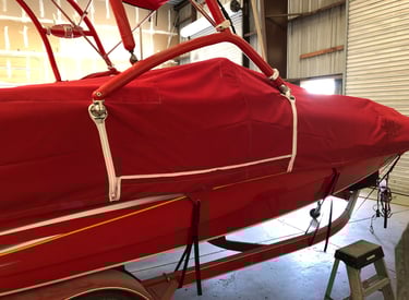 Sunbrella boat cover with zippers.