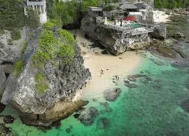 Nestled under Uluwatu’s cliffs, Suluban Beach