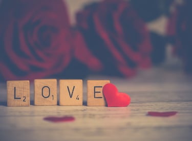 Wooden tiles spelling the word LOVE