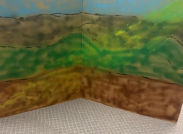 a prop depicting green fields