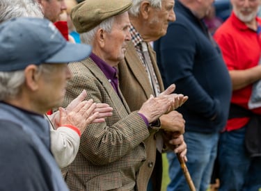 Farmers applauding during an agricultural show in Cwmdu near Builth Wells