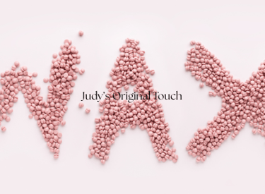 a group of pink beads and beads on a white background