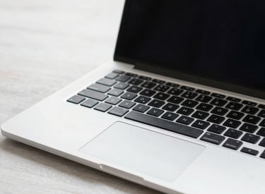 A technician arriving at a residential home with tools.