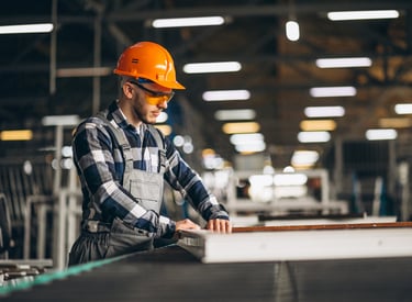 Male Factory Worker wearing a hard hat