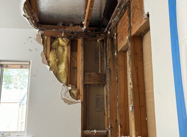 a room with a hole in the ceiling