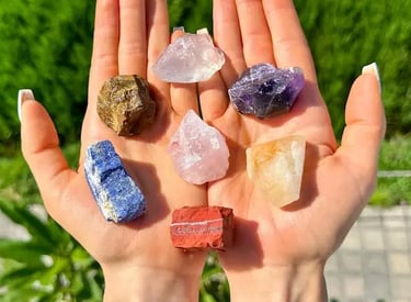 a person holding a bunch of crystals in their hands