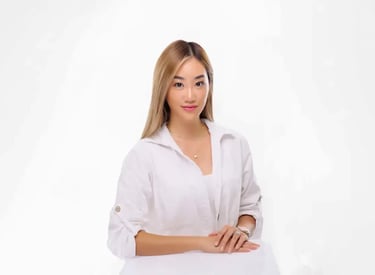 Headshot Photography - a woman in a white shirt and a white shirt