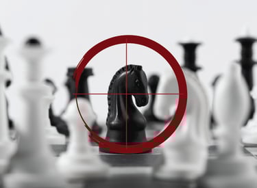 a chess board game with a red crosshair