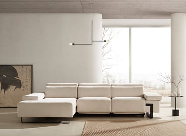 a living room with a couch and a large window