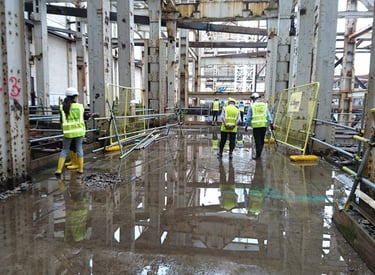 Construction site with workers and equipment