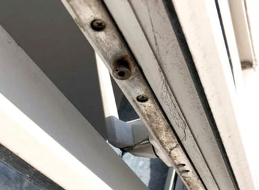 picture of a broken upvc window lock