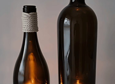 botella reciclada con vela