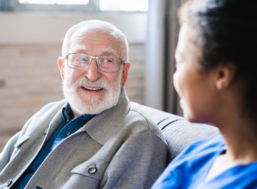 A social care worker in a meeting with a patient