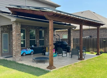 Outdoor Patio with Furniture and Green Grass