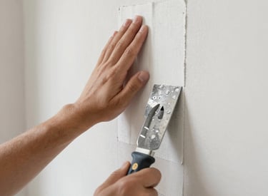 A bathroom with modern tile work and updated fixtures.