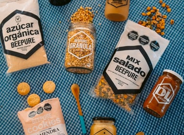 Portfolio BEEPURE distribuido por Vanzzini Chile: granola, mix salado, azúcar orgánica, cookies y dulce de leche