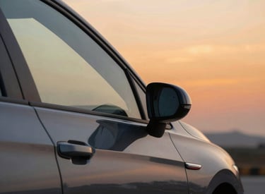 Technician providing maintenance service on industrial energy equipment outdoors.
