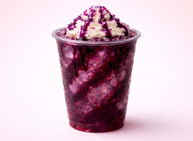 Purple berry flavor bomb dirty soda with crushed ice, whipped cream, and syrup drizzle
