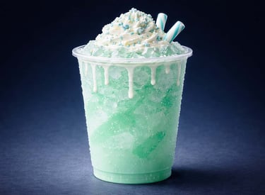 Savage Sodas seasonal special mint dirty soda topped with whipped cream and drizzle