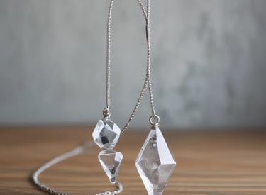 Hands gently performing Reiki energy healing in a tranquil setting.