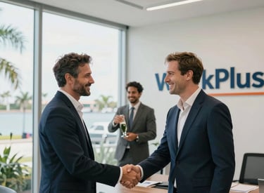 Smiling employees in a modern office celebrating a project success.