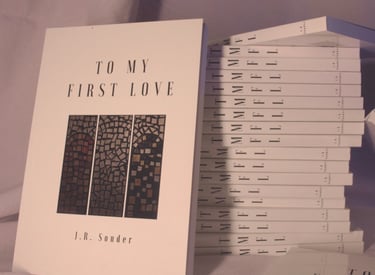 A stack of J.R. Sonder's book To My First Love (TMFL)
