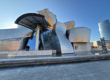 Exterior of the Guggenheim Museum Bilbao with its iconic titanium facade in Bilbao, Spain