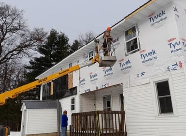 AG's General Contractor finishing up sidings for a home