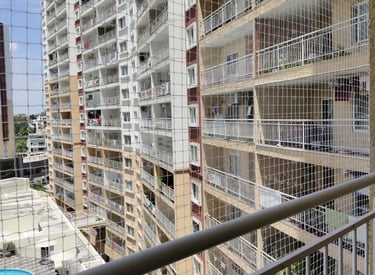 pigeon net securely installed on a Mumbai balcony.