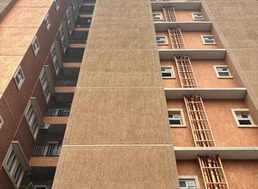multiple apartment balconies in Wadala fitted with pigeon nets.