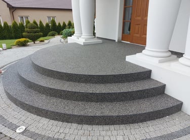 a large set of stairs leading up to a house