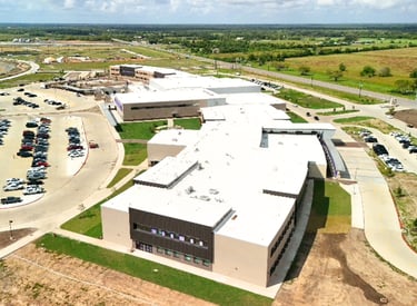 New school construction site with a roof by SRS