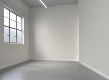 Interior living room walls painted in warm beige with a smooth finish.