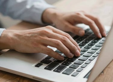 A sleek car key resting on a modern contract document, symbolizing easy financing options.