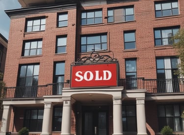 A sleek office building with glass windows reflecting the city skyline.