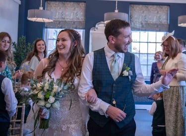bride and groom walking down the aisle