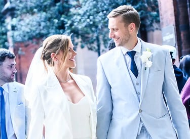 Newly-weds leaving Camden Town Hall after their wedding