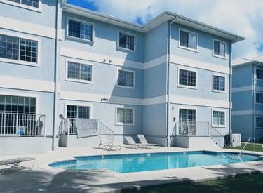 Pool and back yard at Lakeside Cayman Condo