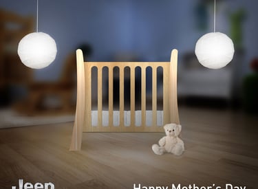 A modern wooden baby crib with a white teddy bear and pendant lights for a Jeep Mother's Day advertisement.