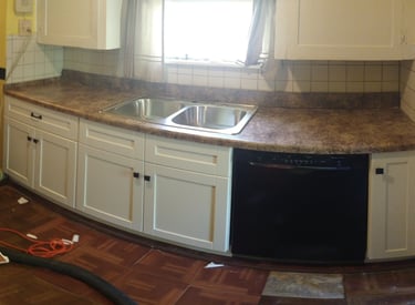 Base cabinet, countertop and sink install. Jul. 2022.