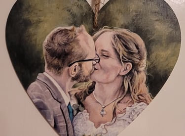 Original acrylic painting on a wooden heart plaque of 2 people by artist Jen Manning