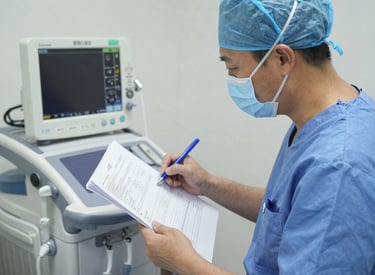 AIMS Technician preparing a detailed maintenance report at a workstation.