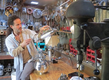 Tal Avitzur working on spaceship sculpture.
