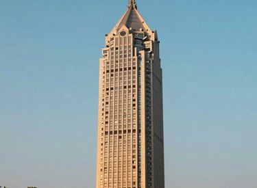 Tall residential tower with multiple floors on Mysore Road, Bangalore
