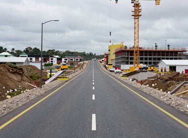 Wind turbines and solar panels integrated in an energy infrastructure site.