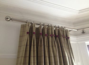 Bespoke curtains with double pleats and contrast covered buttons on each pleat