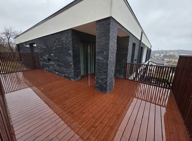 a wooden deck with a wooden decking area and a wooden deck