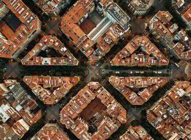 Zona con propiedades compartidas, herencias e indivisas. Vista aérea del Eixample en Barcelona.