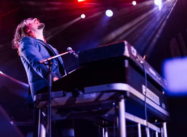 Captivating moments from Lachy Doley performance expertly captured by event photographer.